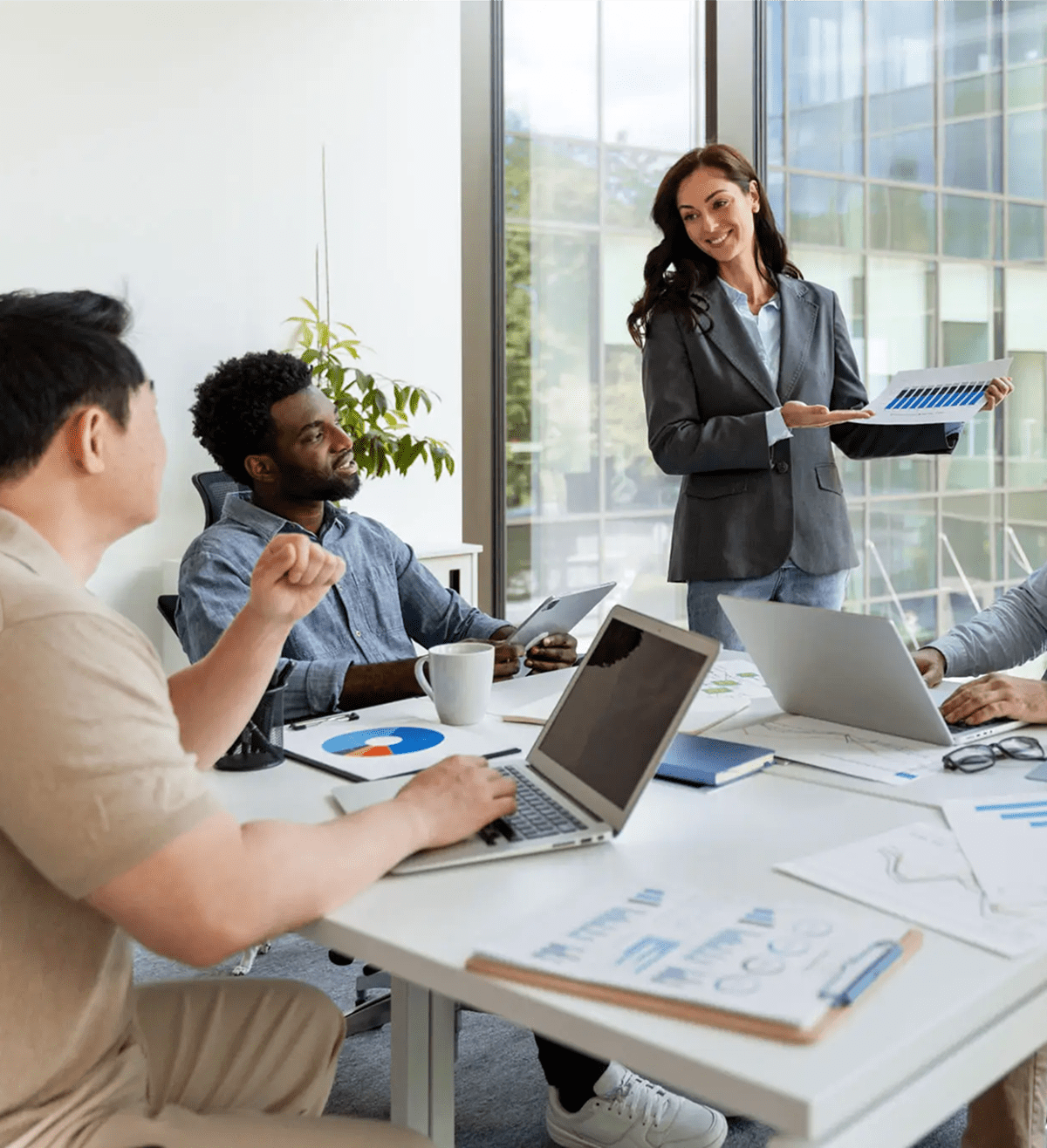 Team analyzing data during a presentation
